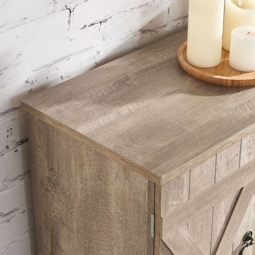 Front view of the gray wooden TV console with open storage space