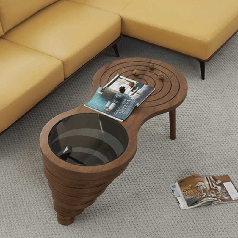 Angle view of Charming 47-Inch Rustic Coffee Table showing the beehive design and glass top.