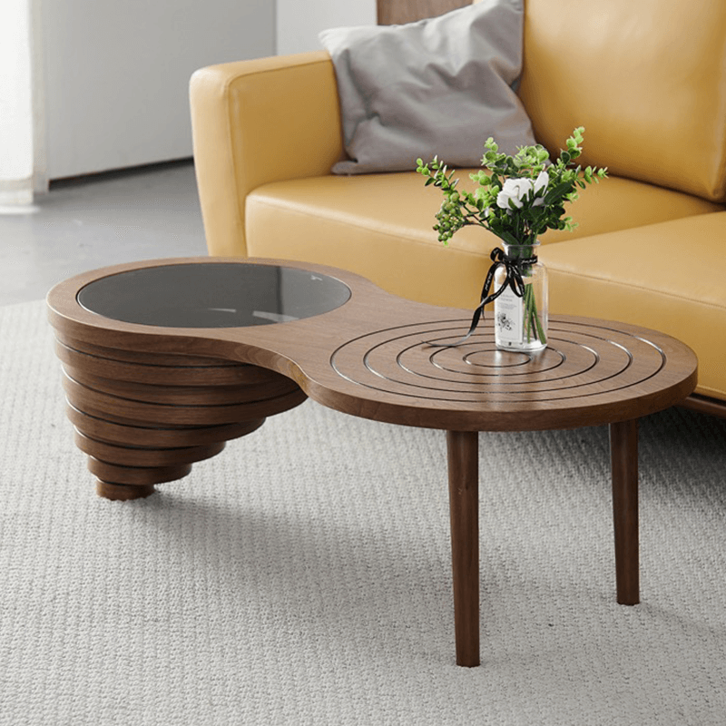Angle view of Charming 47-Inch Rustic Coffee Table showing the beehive design and glass top.