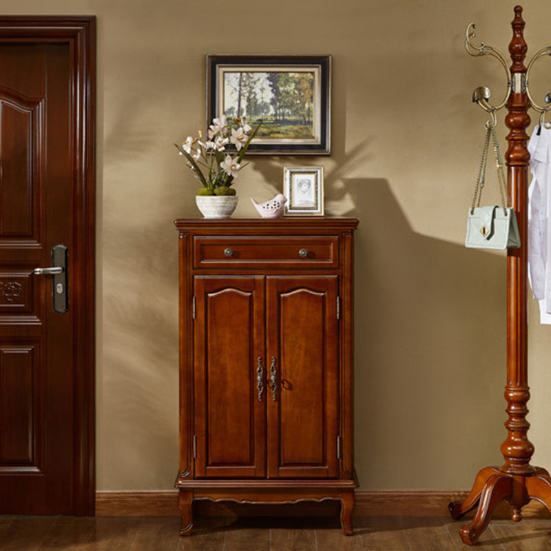 Side view of the vintage wooden shoe cabinet showcasing its sleek design