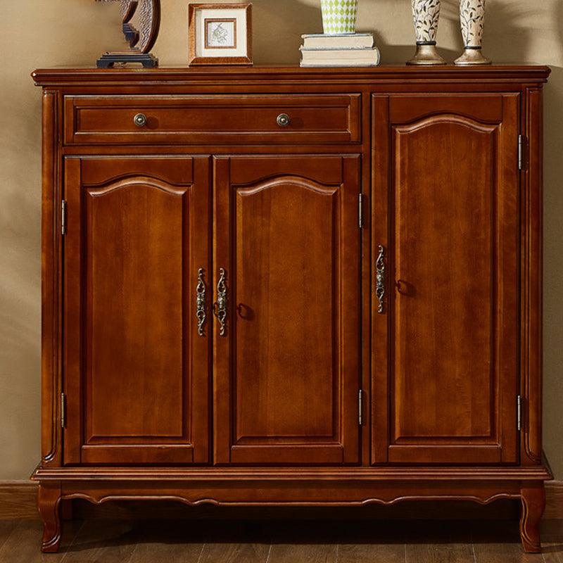 Side view of the vintage wooden shoe cabinet showcasing its sleek design