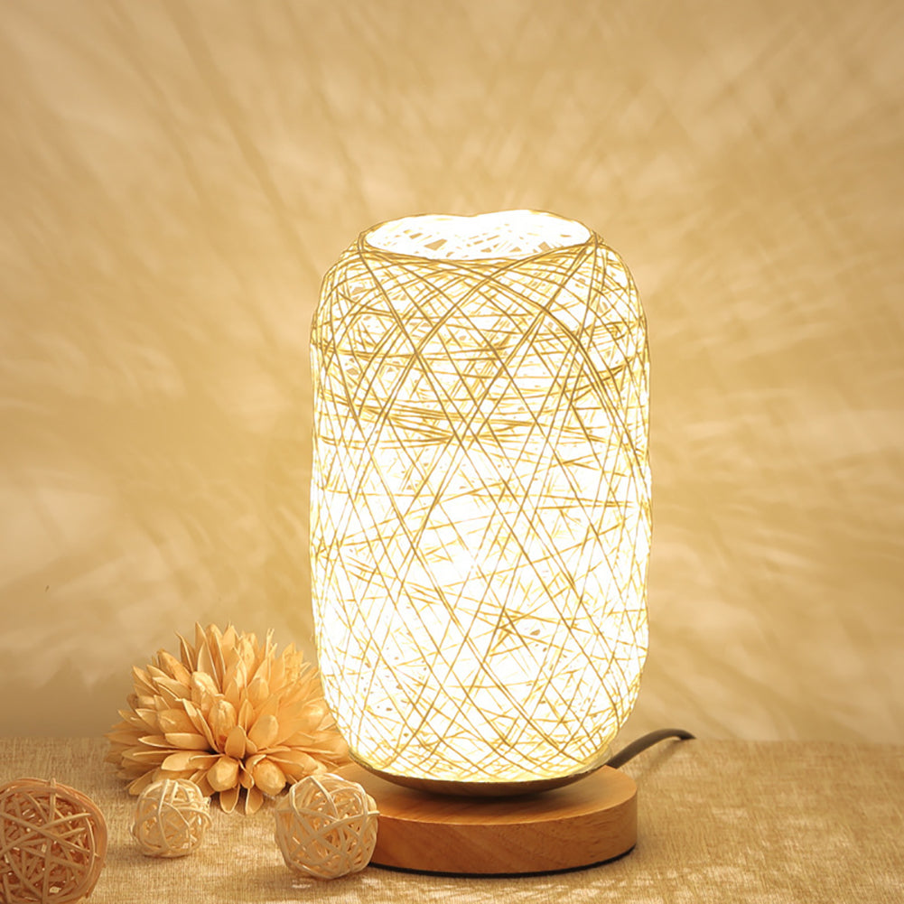 The lamp placed on a stylish desk, illustrating its use in a home office setting.