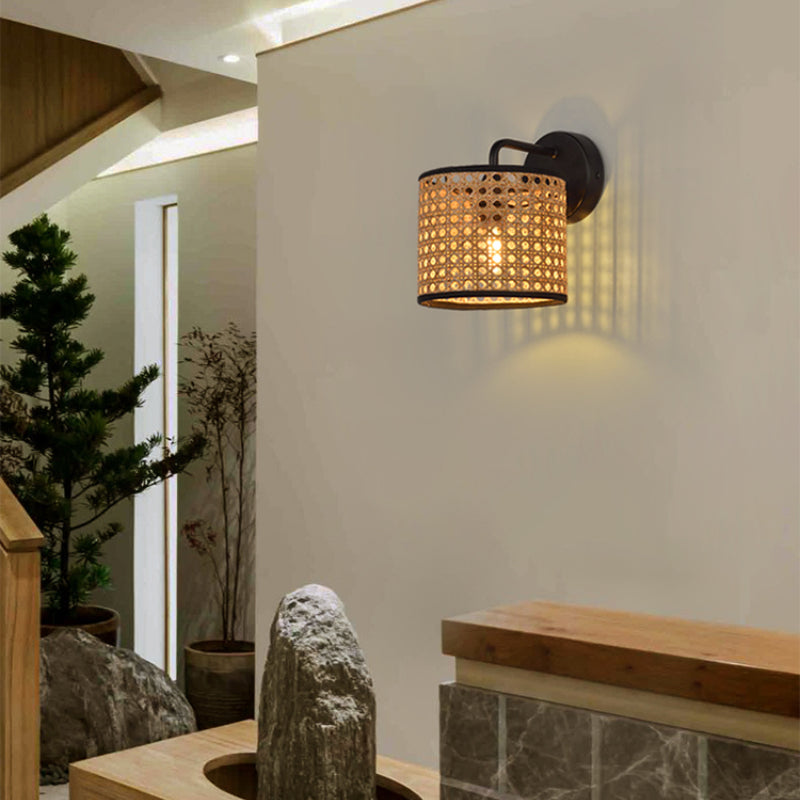 The rattan wall light installed in a cozy living room, creating a warm ambiance.