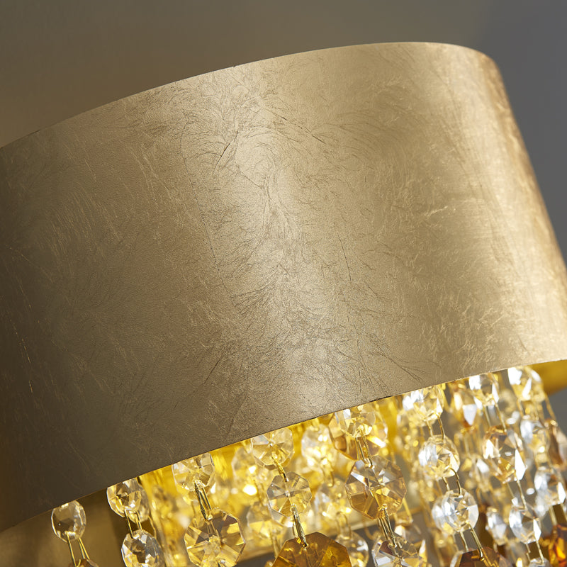 Close-up of the best modern wall sconce for bedroom, demonstrating its warm light and elegant structure.