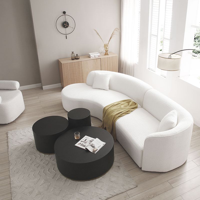 Elegant 126" curved luxury sofa set with chaise in a bright living room.