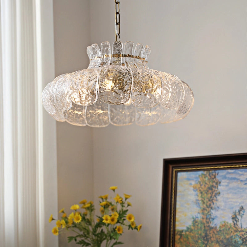 Chic French flower petal glass pendant light hanging in a modern kitchen