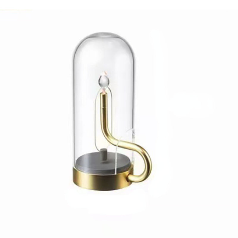 Close-up of the LED table lamp with candle flame effect highlighting its intricate glass design.