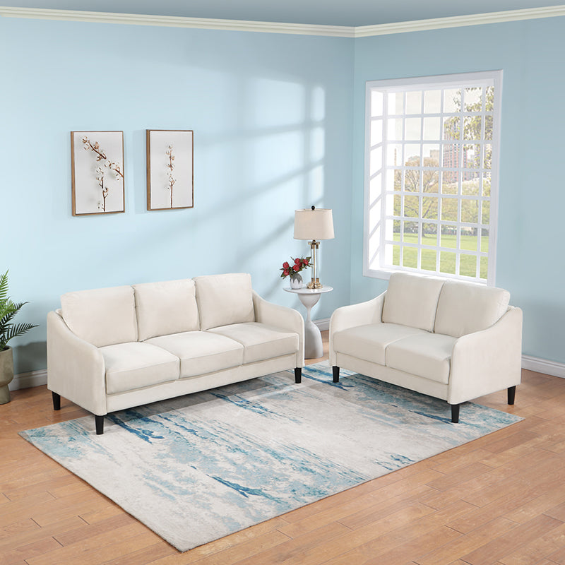 Modern beige loveseat sofa view from the front, showcasing its elegant design.
