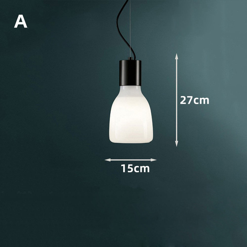 Close-up view of the green glass pendant light highlighting the unique hand-crafted workmanship and color variations.
