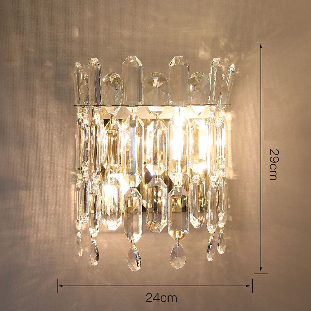 Elegant gold crystal wall lamp showcasing LED light with a modern design.