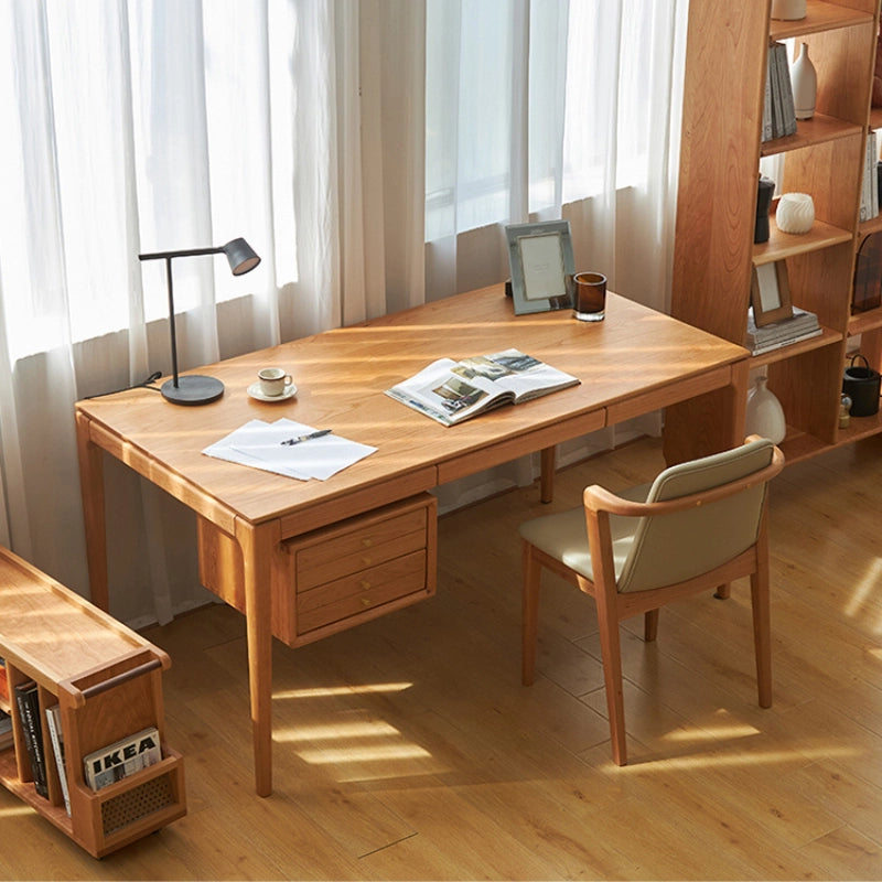 Side view of the cherry wood office desk with floating cabinet installed.