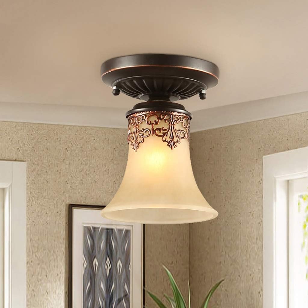 Retro flush mount ceiling light showcasing frosted glass design from an angle