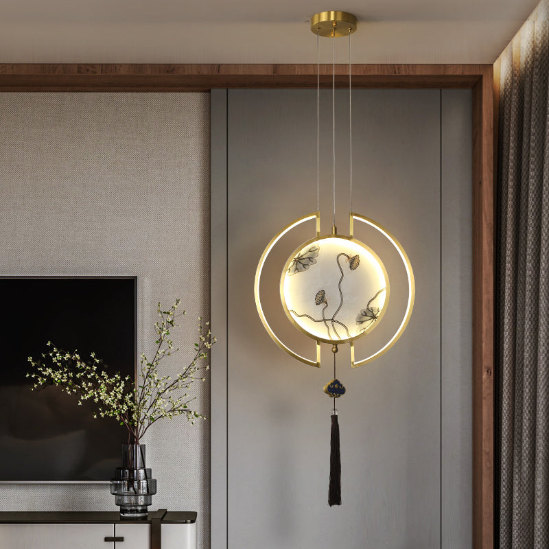 Close-up of the stained glass light illuminating a cozy living room setting.