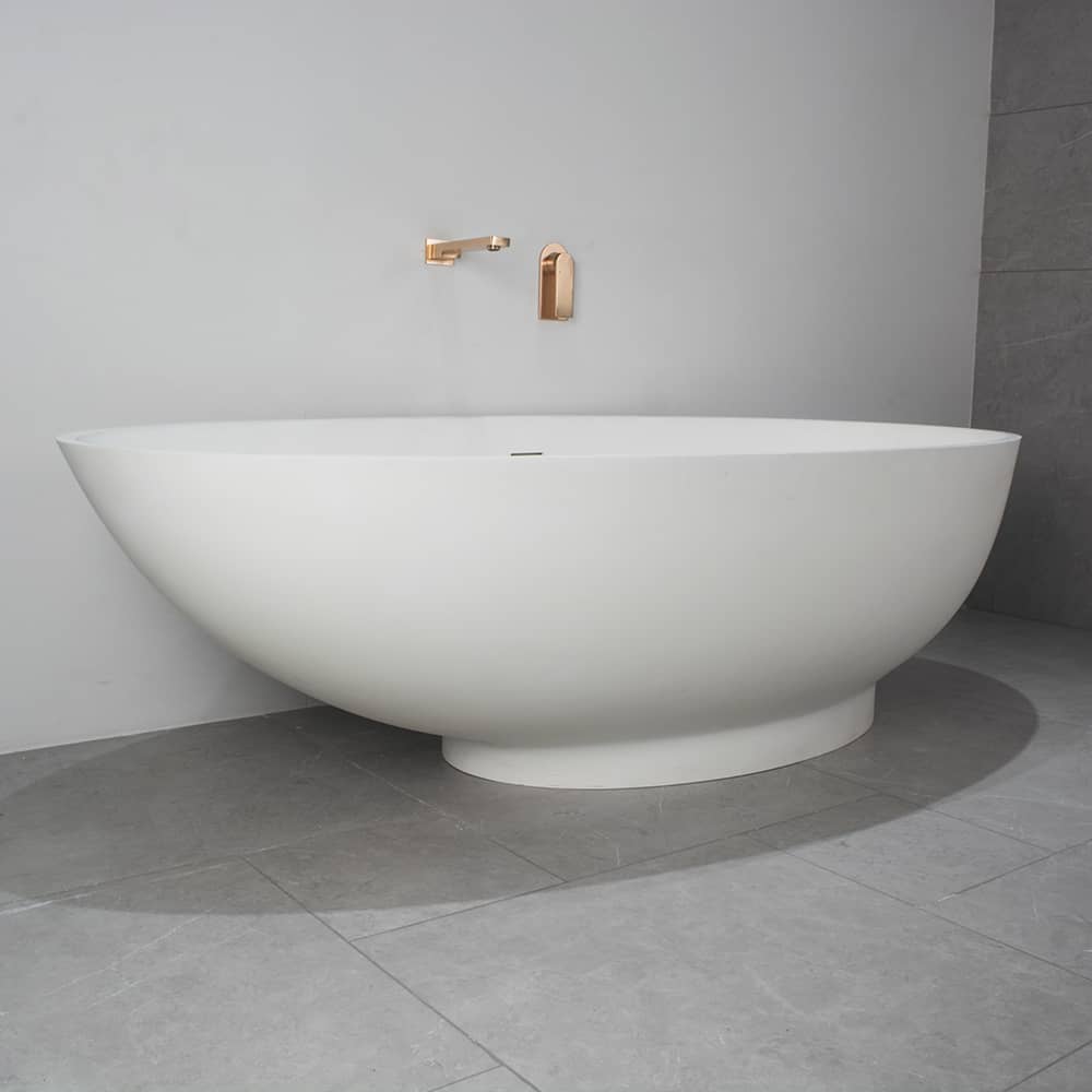 Top-down view of the oval freestanding stone resin bathtub accentuating its modern design.