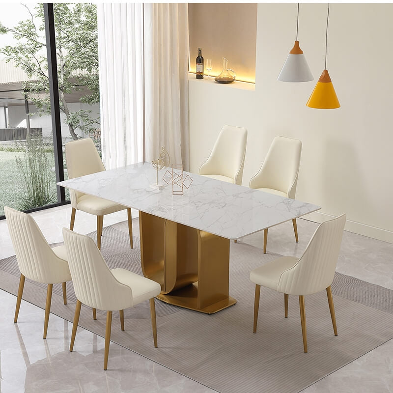 Close-up of the sleek sintered stone surface on the dining table, highlighting its modern design and durability.