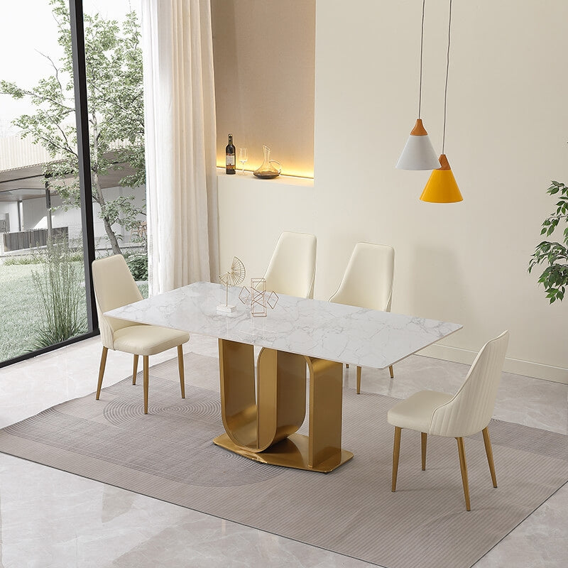 View of the elegant 71-inch sintered stone dining table set showcasing gold U-shaped pedestal base and contemporary chairs.