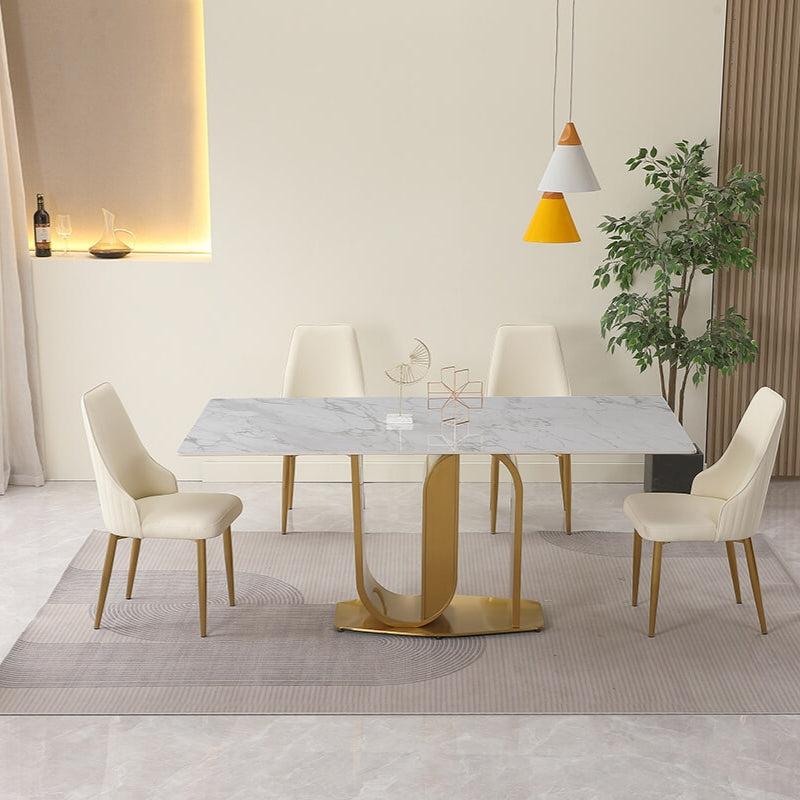 Close-up of the sleek sintered stone surface on the dining table, highlighting its modern design and durability.