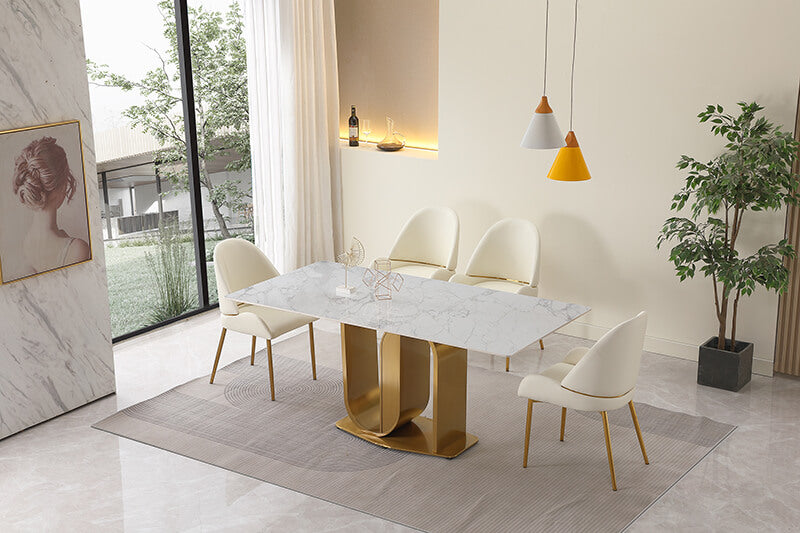 Close-up of the gold U-shape pedestal base supporting the sintered stone dining table.