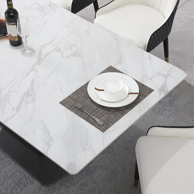Close-up of the elegant sintered stone dining table with six stylish chairs, perfect for contemporary homes.