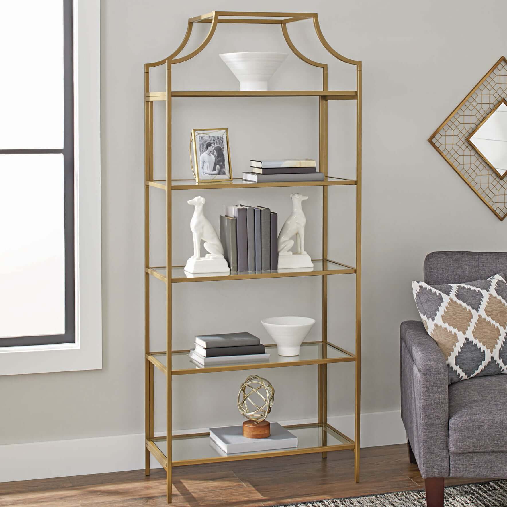 Elegant 71-inch etagere bookcase showcasing decorative items and books in a modern living room.