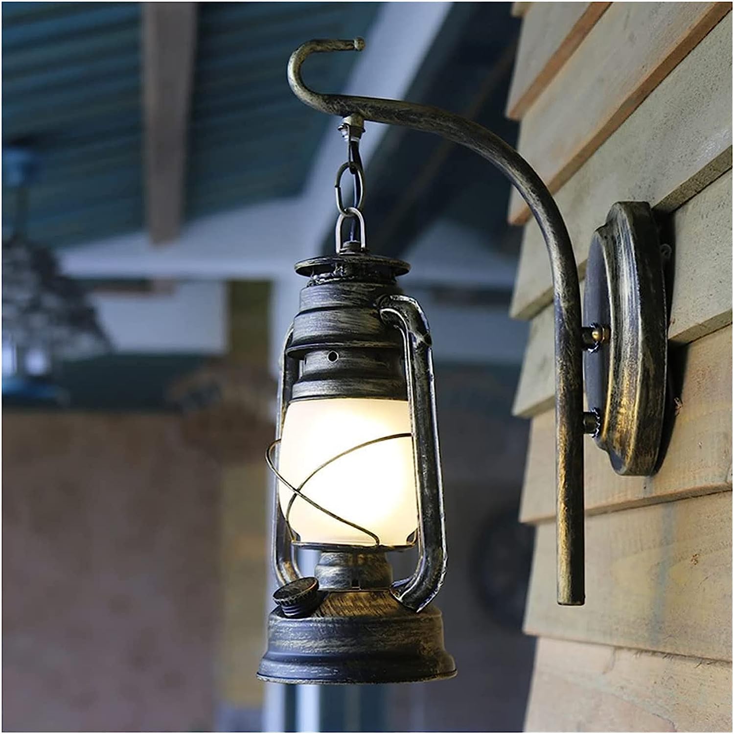 Rustic Vintage Barn Lantern Wall Light with frosted glass shade in a modern dining room setting.
