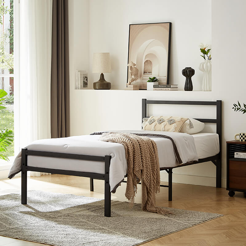 Side view of the elegant metal twin bed frame showcasing the headboard and footboard.