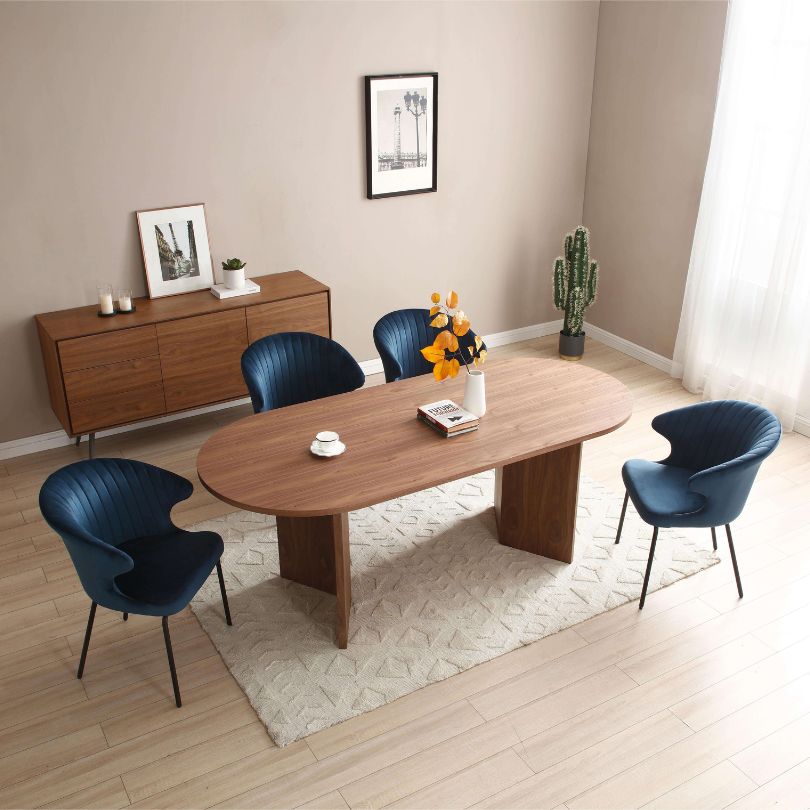 Elegant walnut farmhouse oval dining table set for eight, showcasing its spacious top and smooth edges.