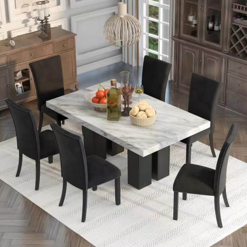 Close-up of the sleek faux marble dining table showcasing its luxurious finish and ample space for dining.