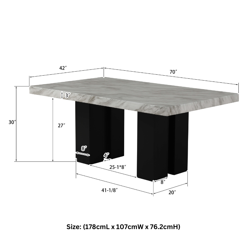 Luxury faux marble dining table set with blue velvet chairs from an angled view.