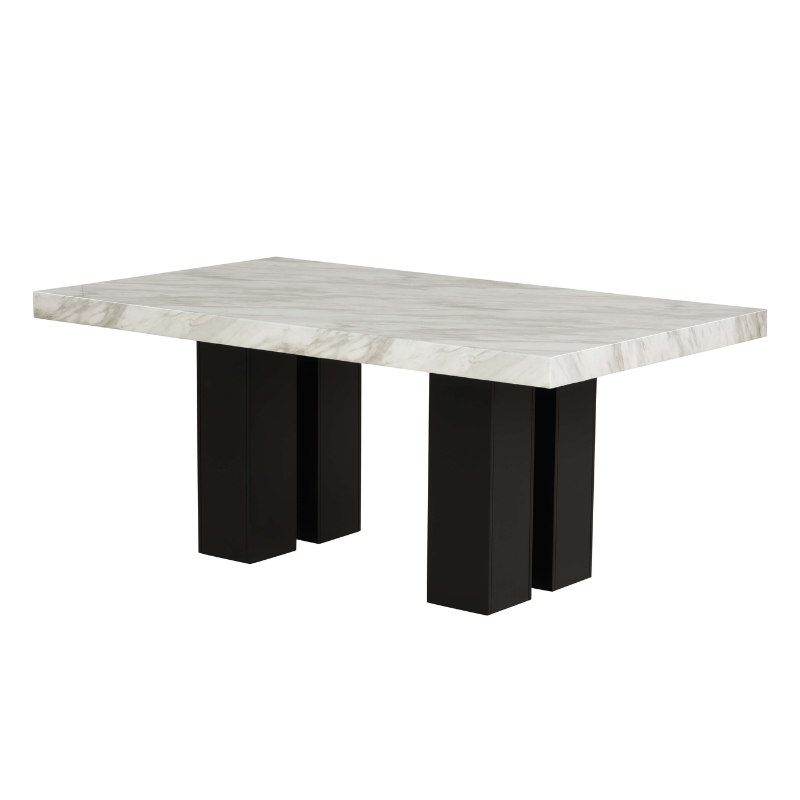 Luxury faux marble dining table set with blue velvet chairs from an angled view.