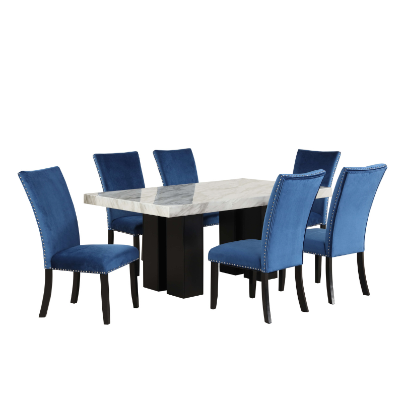 Close-up of the plush velvet dining chairs highlighting their tufted design.