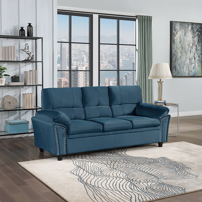 Stylish angle of the best 3-seater blue couch in a modern living room setting.