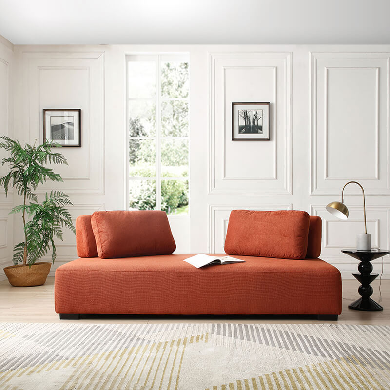 Front view of the chic orange modular sofa showcasing its minimalist design and non-slip cushions.