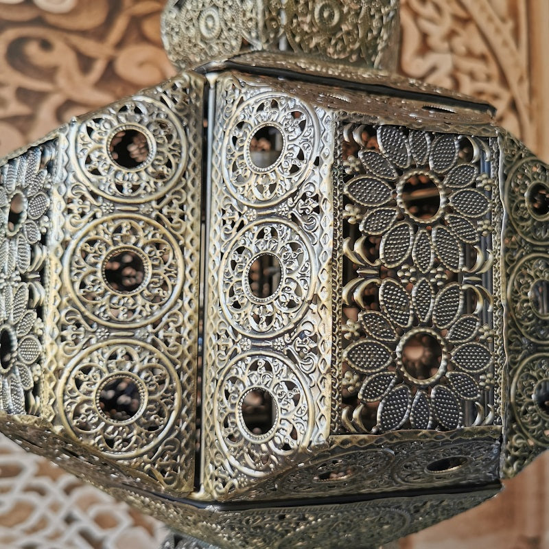 Close-up of the Moroccan style vintage hollow carved pendant light showcasing intricate metalwork.
