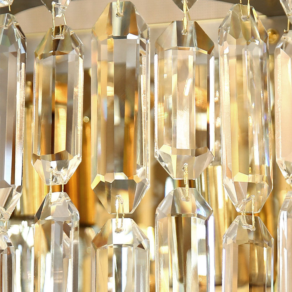 Close-up of the crystal shade on the luxury gold wall lamp, highlighting its intricate details.
