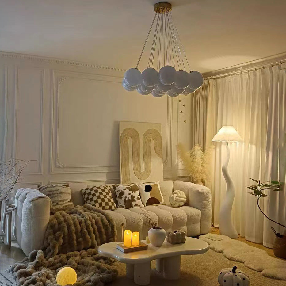 The foot switch of the Elegant Curved Mushroom Floor Lamp in a stylish bedroom, providing easy access.