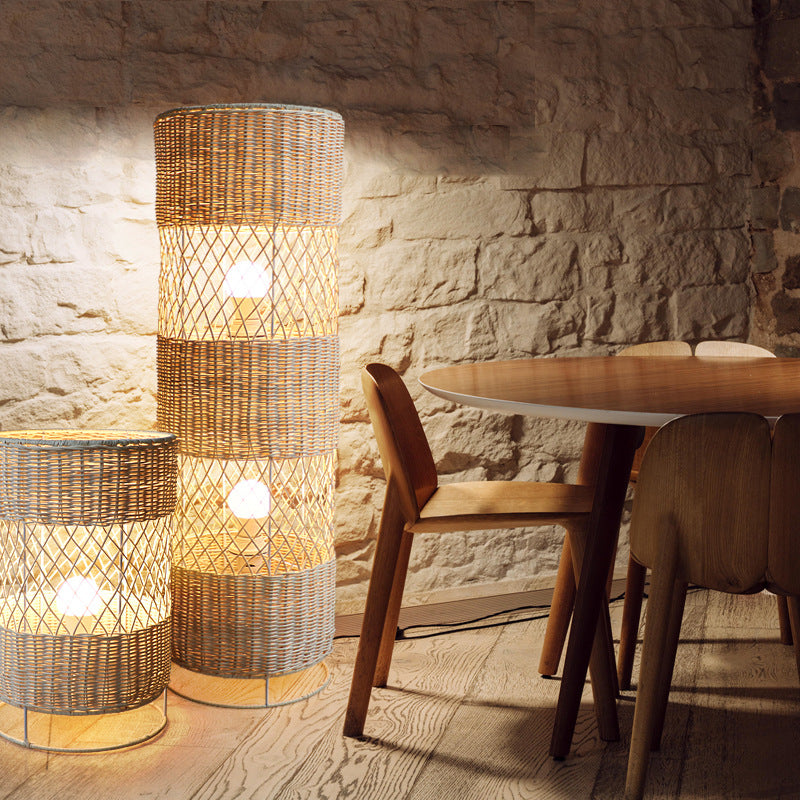 Close-up of the bamboo shade and rattan details of the floor lamp, showcasing its handwoven craftsmanship.