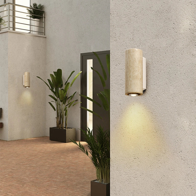 Side view of the waterproof wall sconce demonstrating its cylindrical design and solid wood base.