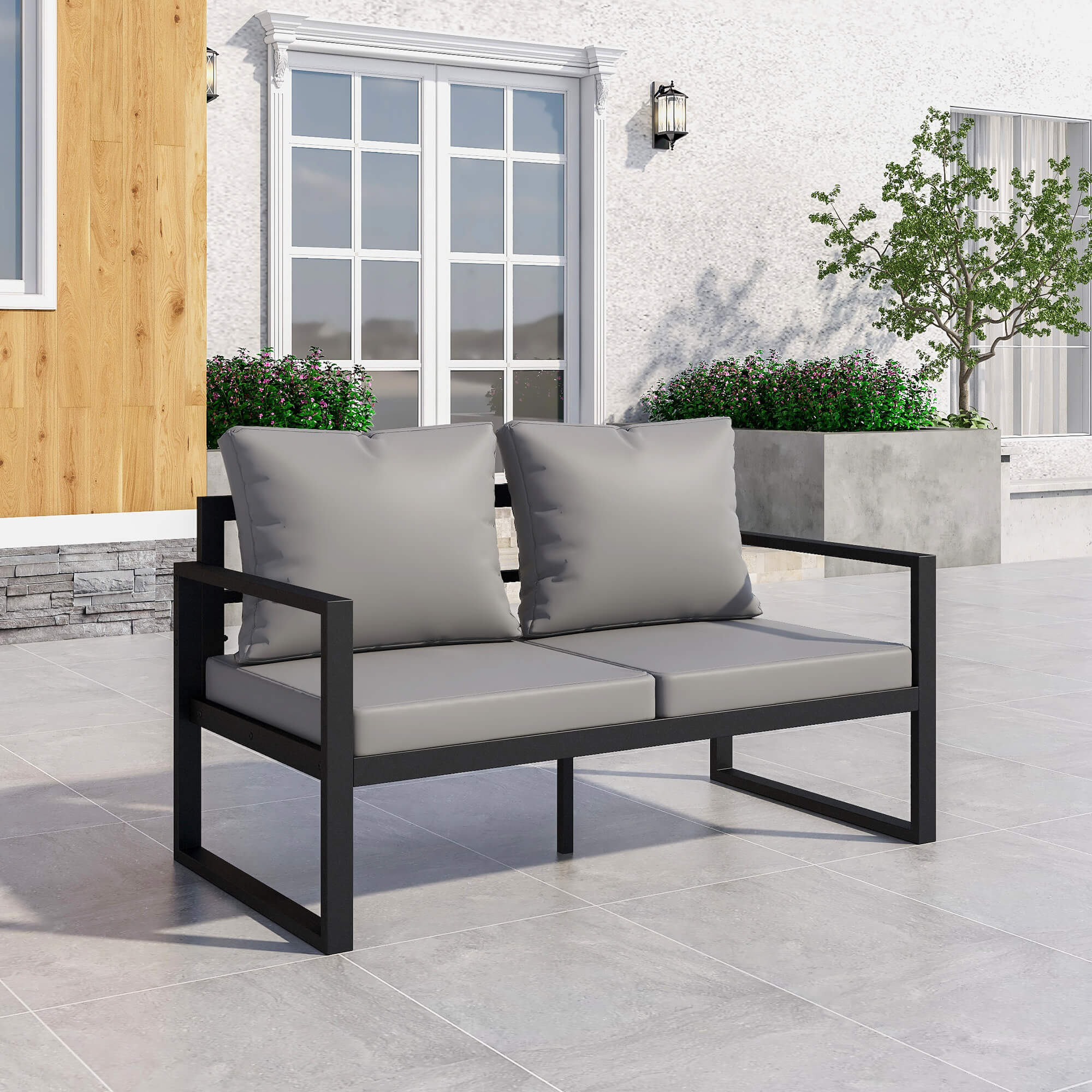 Metal armchair and modern loveseat on a patio for comfortable outdoor seating
