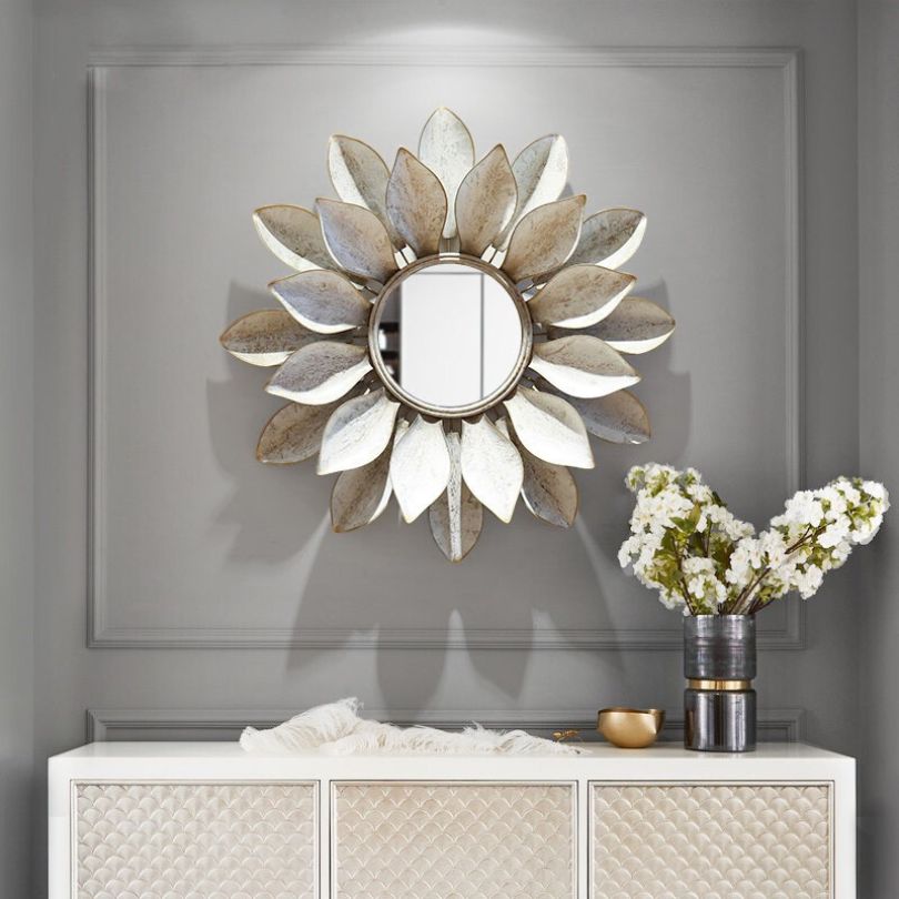 Front angle of vintage mirror with lotus petal ironwork