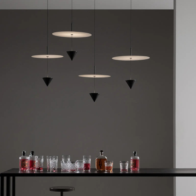 Chic Art Deco LED pendant light illuminating a stylish dining room.
