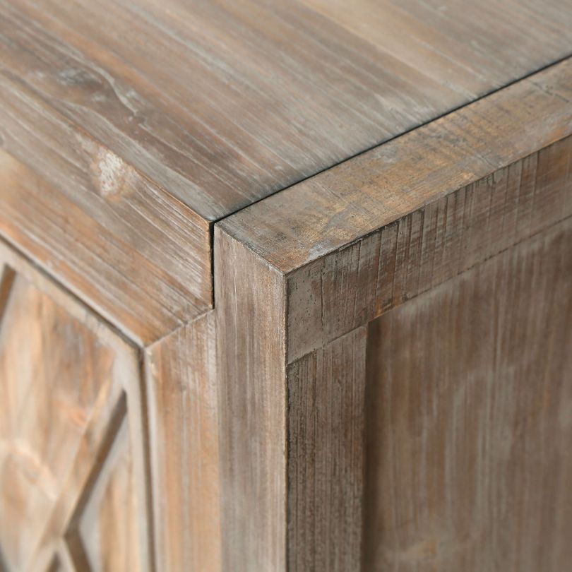 View of the antique grey wood sideboard showcasing its four doors and elegant metal handles.