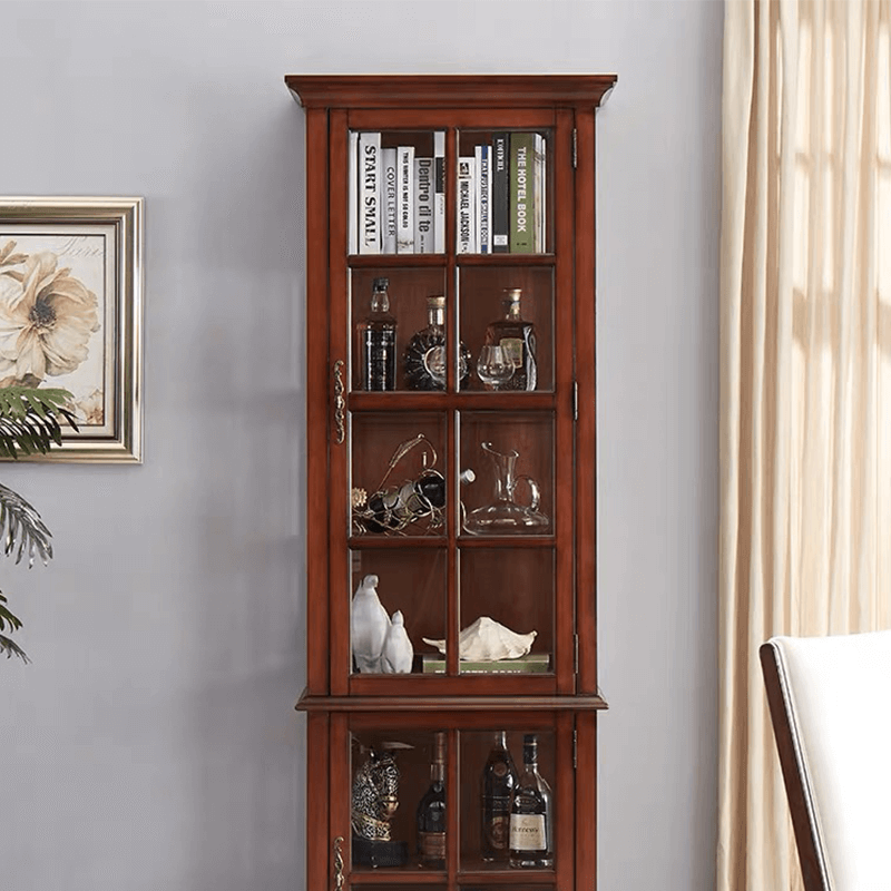 Elegant antique wine cabinet showcasing a wine collection through glass doors from a frontal view.