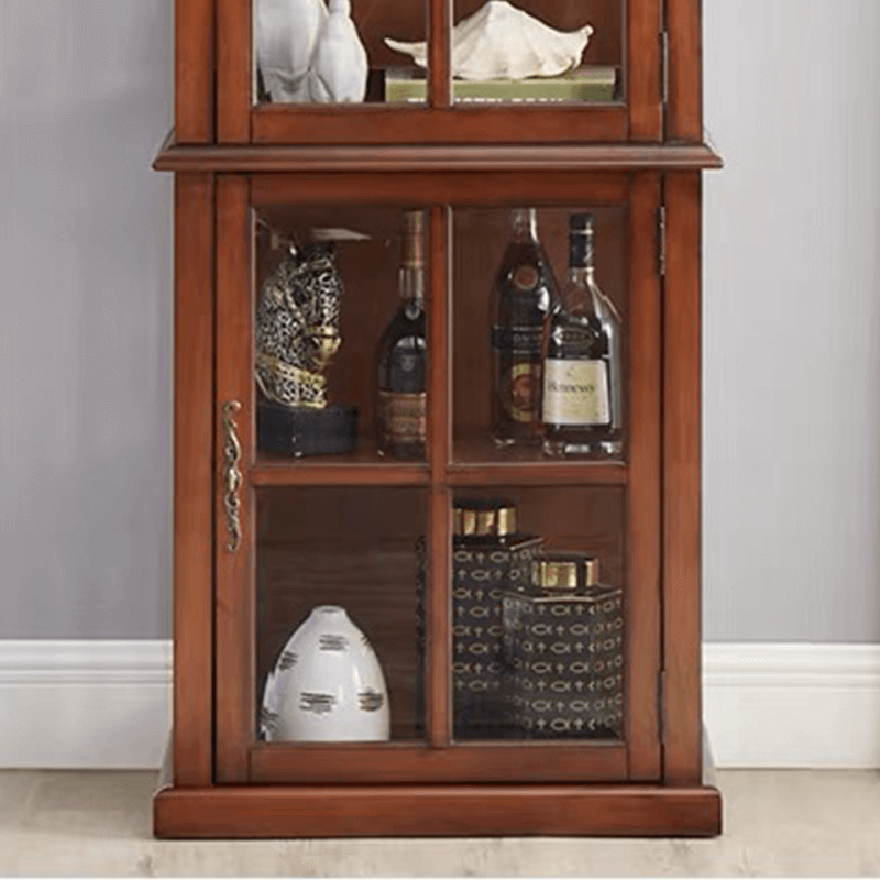 Elegant antique wine cabinet showcasing a wine collection through glass doors from a frontal view.