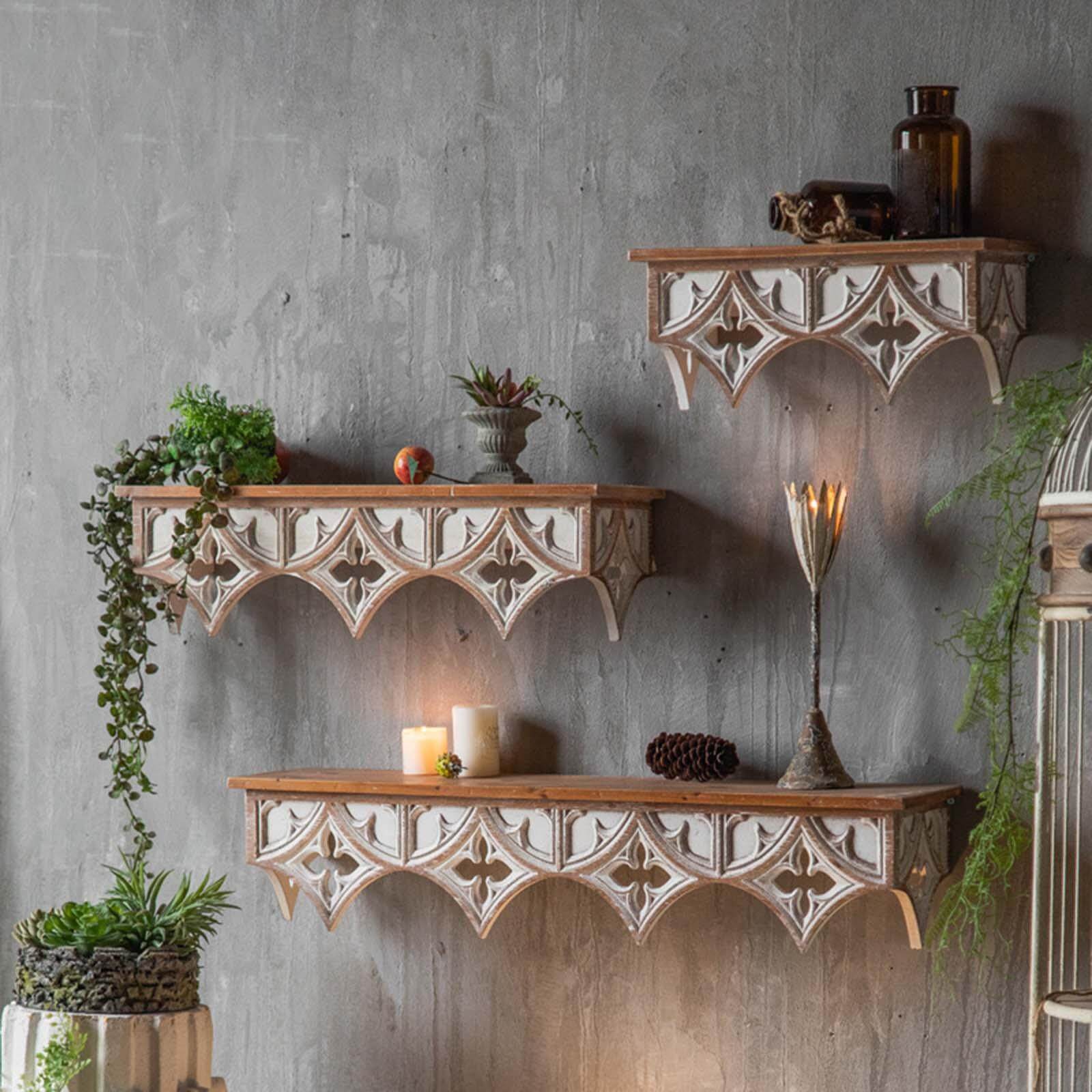 Vintage Charm Wall Shelf showcasing its hand-carved design in a cozy living room setting.
