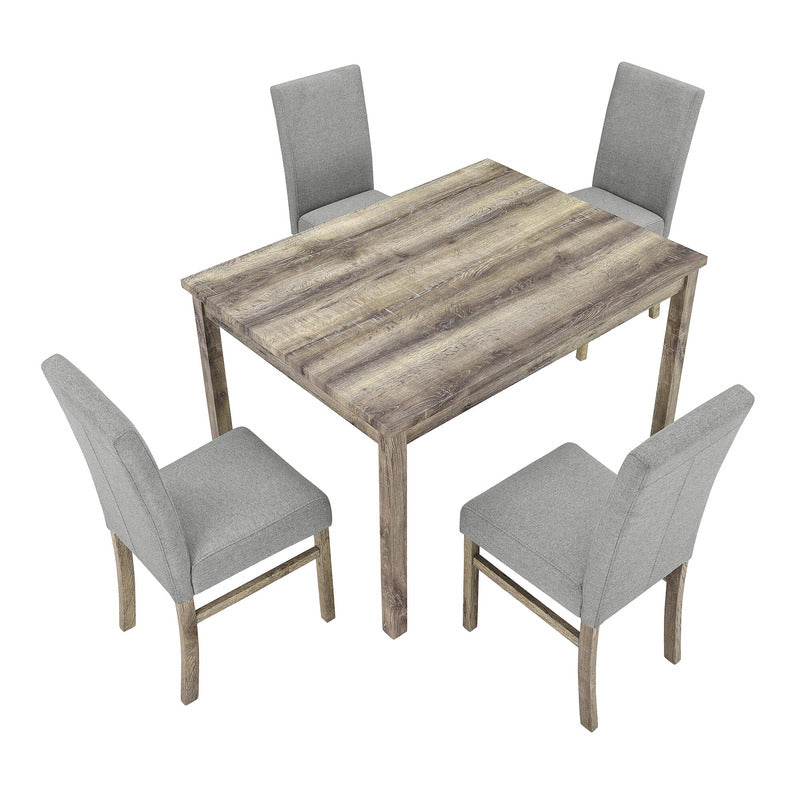 Close-up of rustic furniture details on the antique dining table with chairs