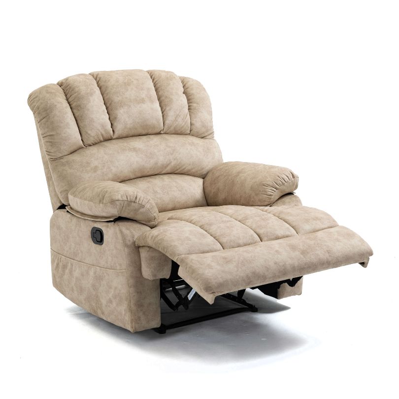 A cozy view of the beige overstuffed fabric manual recliner chair, showcasing its plush design and inviting appearance.