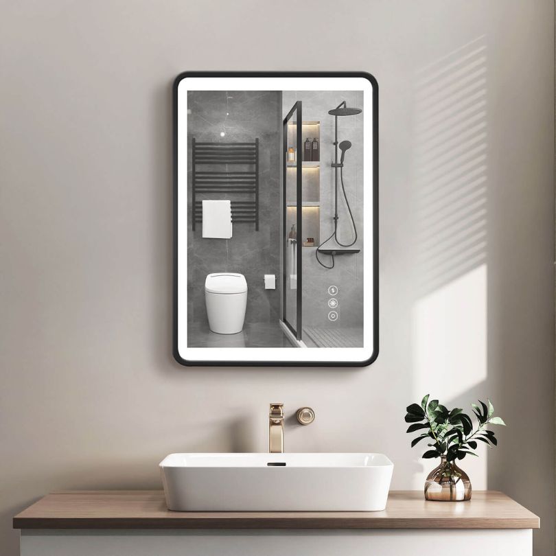 Close-up of the touch sensor controls on the LED bathroom mirror