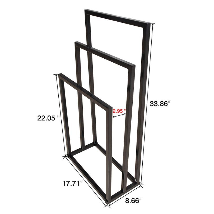 Chic black metal freestanding towel rack showing towels neatly arranged