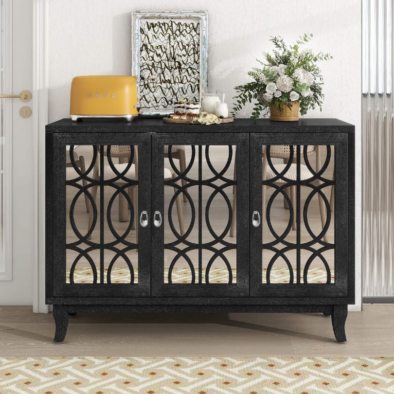 Front view of the elegant black wood buffet cabinet showcasing mirrored doors.